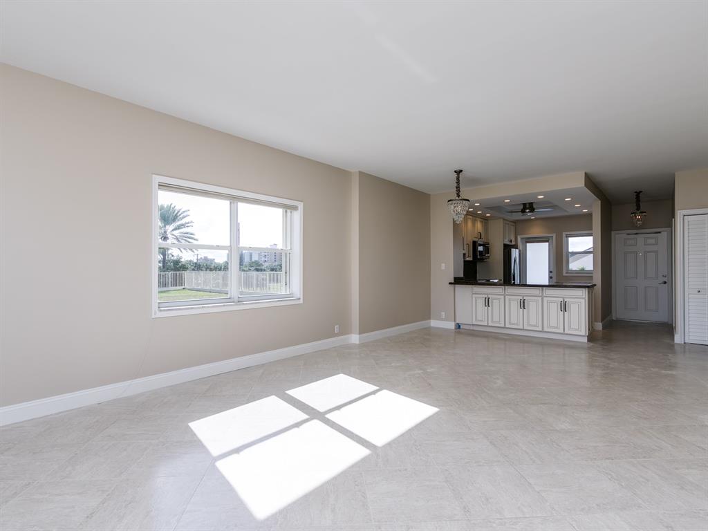 750 North Ocean Boulevard, Unit 210 Pompano Beach, FL 33062 - Photo 12 of 57 a view of livingroom with hardwood