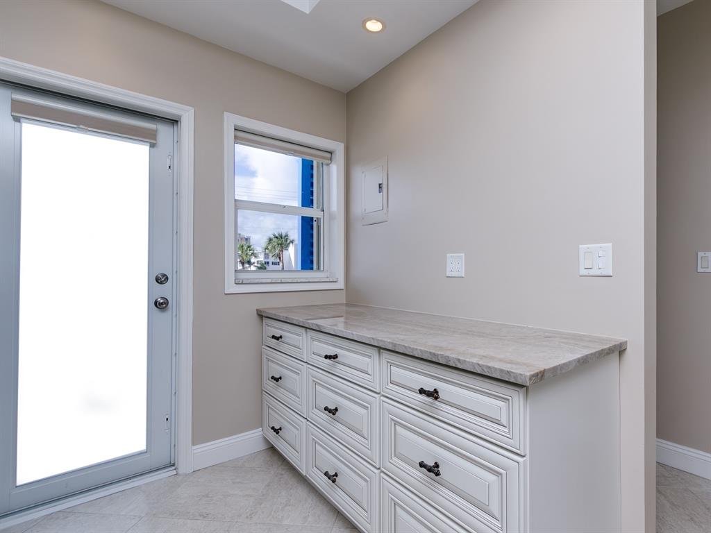 750 North Ocean Boulevard, Unit 210 Pompano Beach, FL 33062 - Photo 16 of 57 a view of cabinet and window