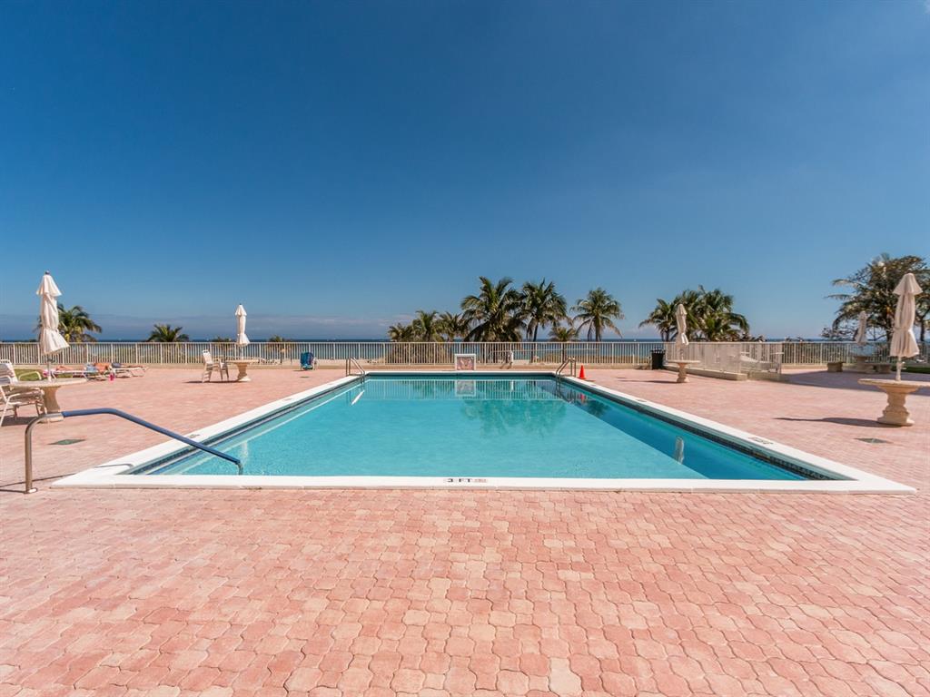 750 North Ocean Boulevard, Unit 210 Pompano Beach, FL 33062 - Photo 17 of 57 swimming pool view with a outdoor space
