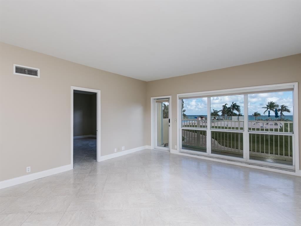 750 North Ocean Boulevard, Unit 210 Pompano Beach, FL 33062 - Photo 48 of 57 a view of an empty room with a window