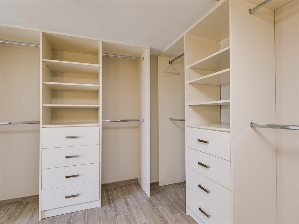 750 North Ocean Boulevard, Unit 210 Pompano Beach, FL 33062 - Photo 10 of 57 a view of walk in closet with empty racks