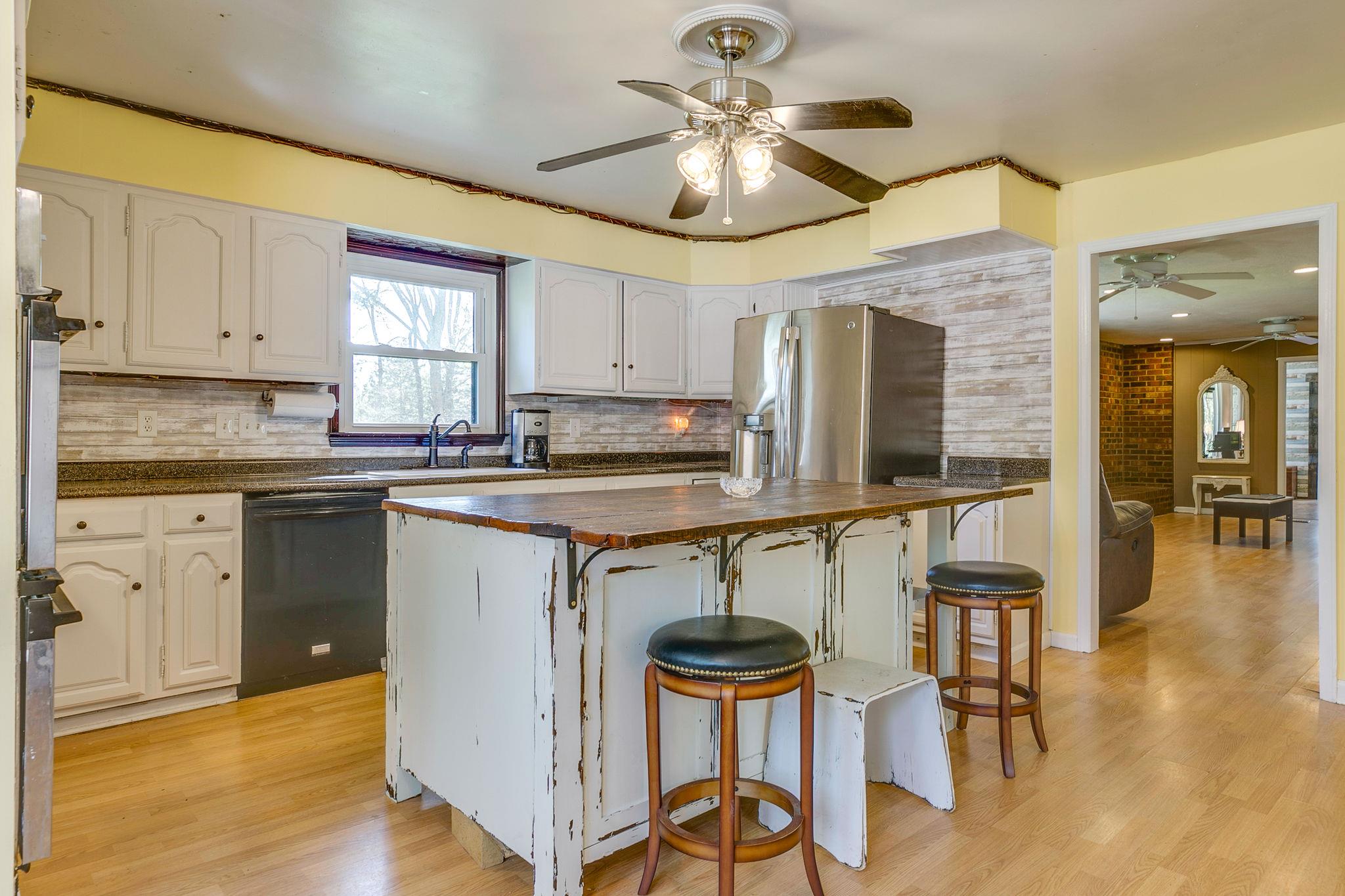 3547 Central Valley Road Murfreesboro, TN 37129 - Photo 7 of 29 Kitchen has a Beautiful Island with a wood top