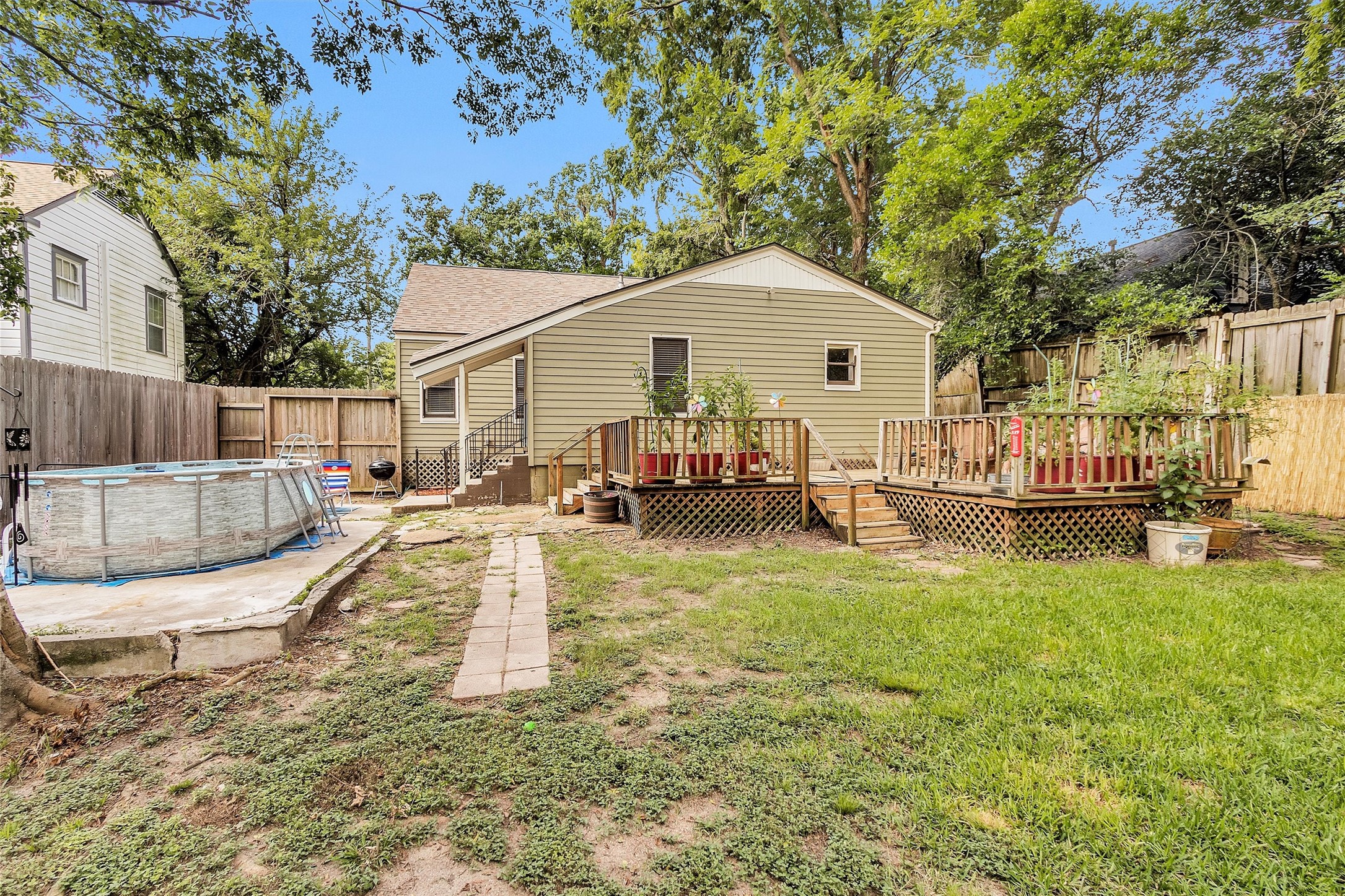 1720 18th Street Huntsville, TX 77340 - Photo 37 of 37 a view of a house with swimming pool and sitting area