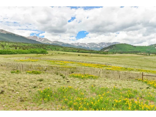 a view of a house with a ocean view