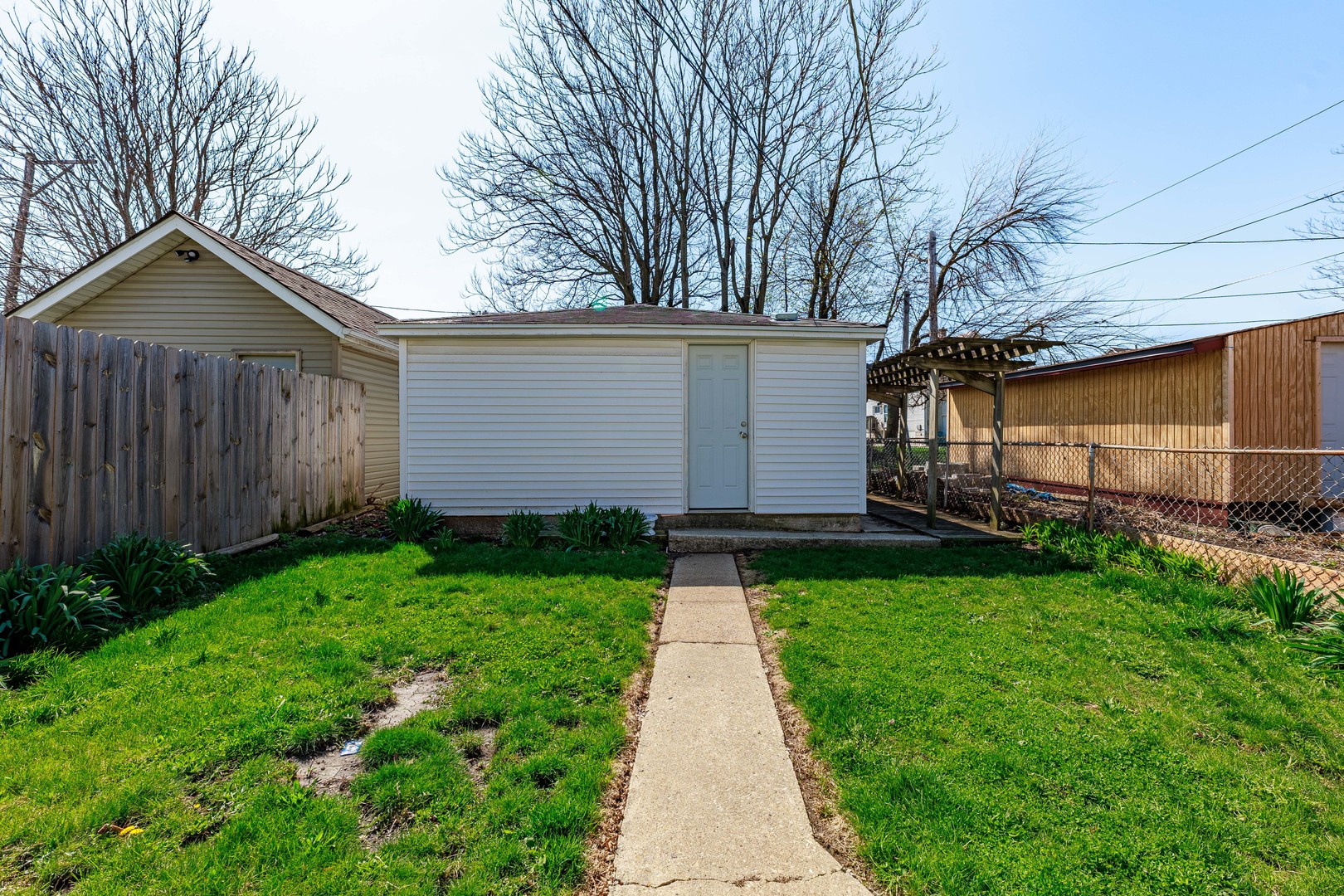 82 Isa Avenue Chicago Heights, IL 60411 - Photo 14 of 16 a view of a backyard with a garden