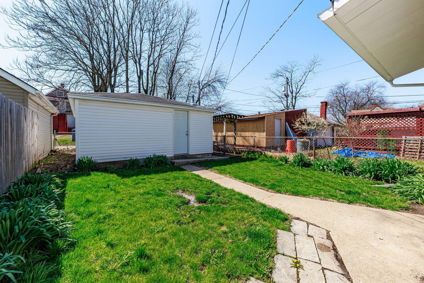 82 Isa Avenue Chicago Heights, IL 60411 - Photo 15 of 16 a view of a house with backyard and garden