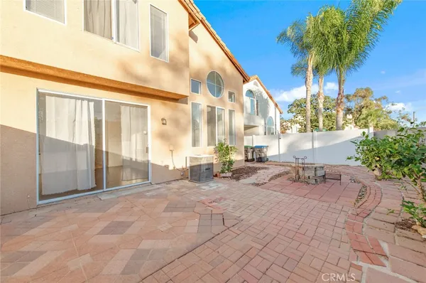 a outdoor space with lots of potted plants