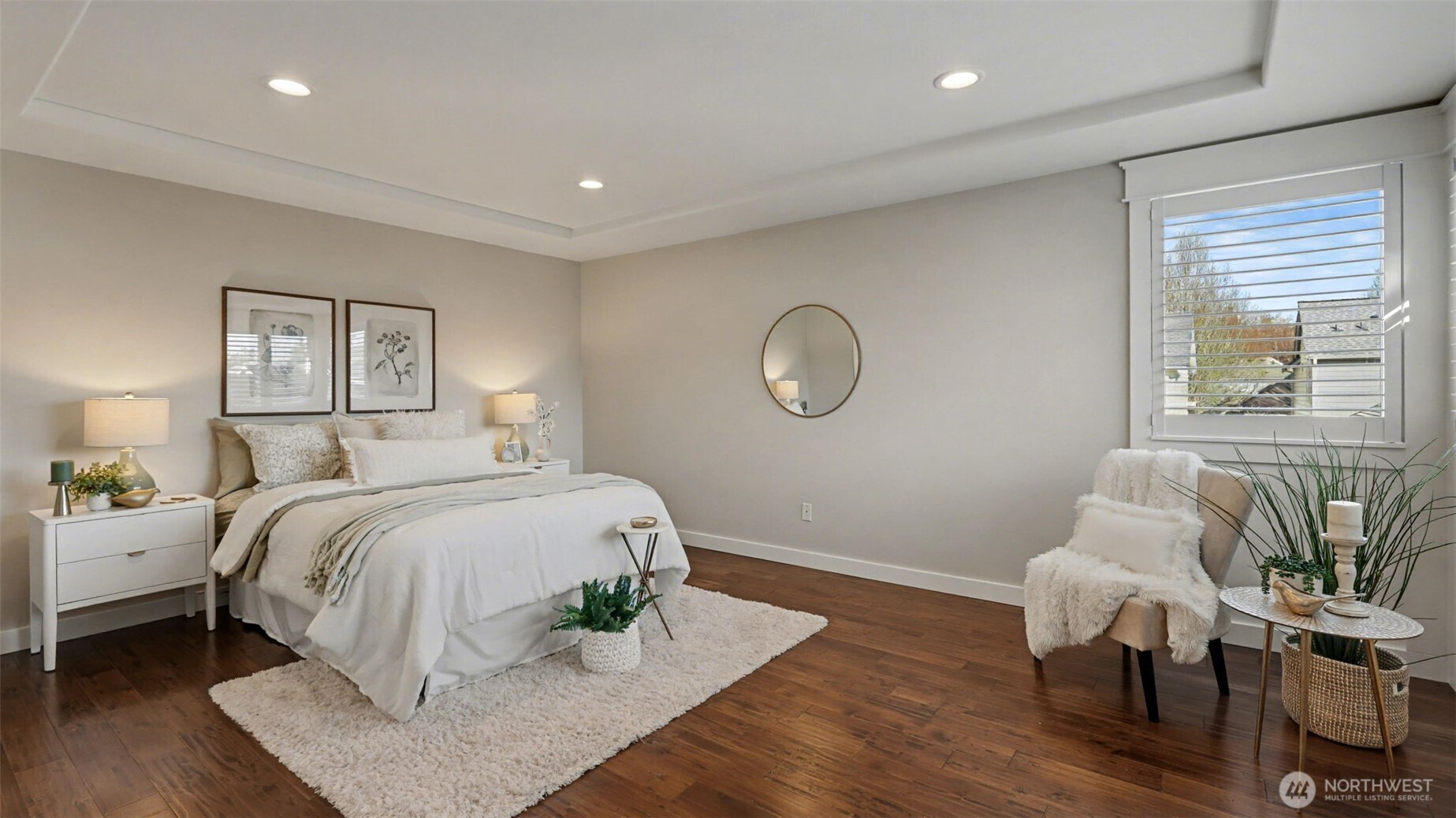 4817 Hartford Way Mukilteo, WA 98275 - Photo 25 of 36 a bed room with a bed mirror and a window