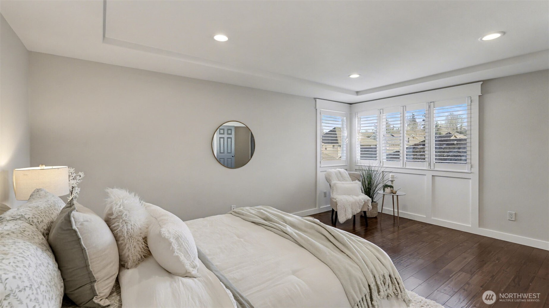 4817 Hartford Way Mukilteo, WA 98275 - Photo 26 of 36 a bedroom with a large bed and a window