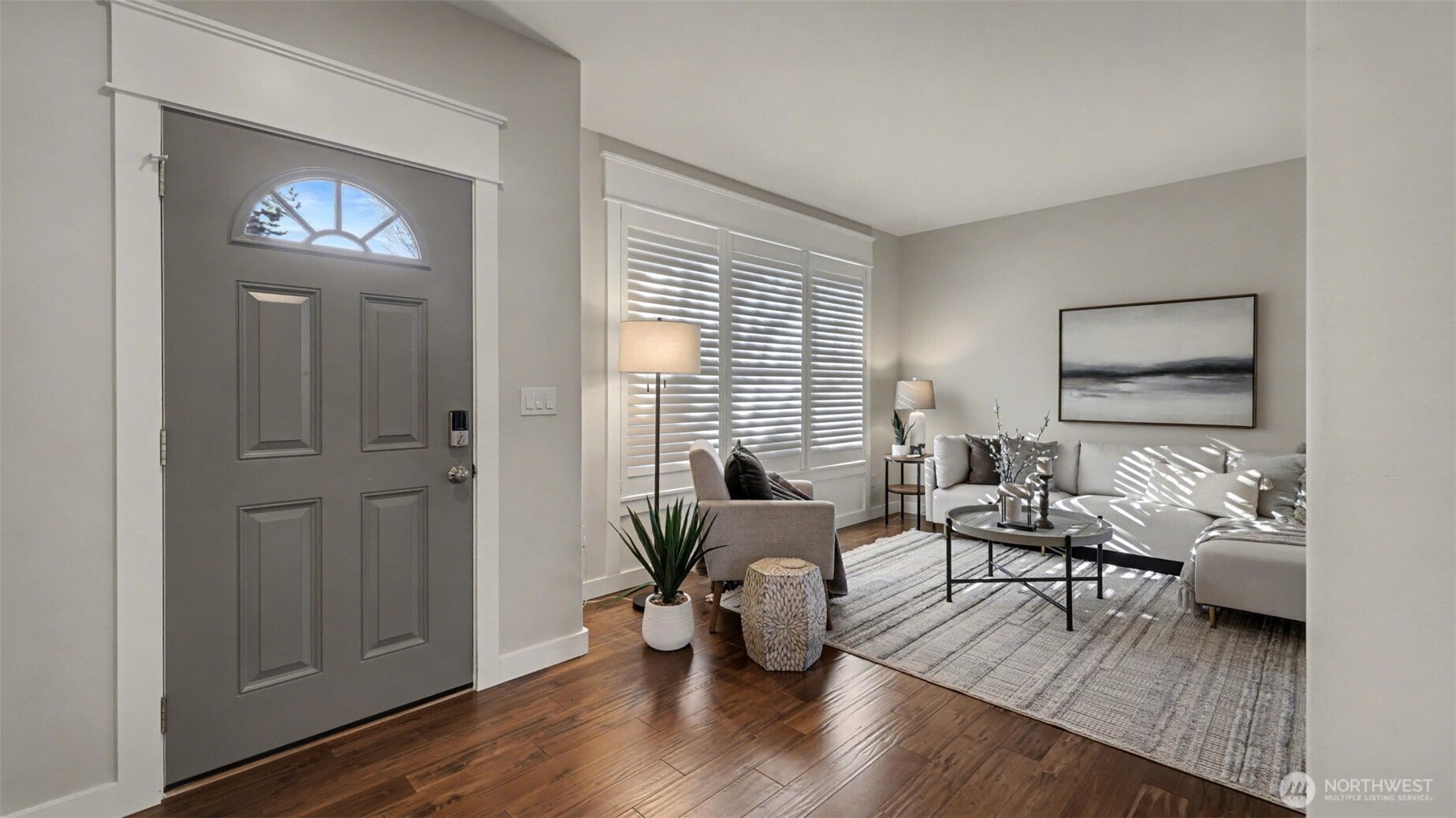 4817 Hartford Way Mukilteo, WA 98275 - Photo 3 of 36 a living room with furniture and a wooden floor