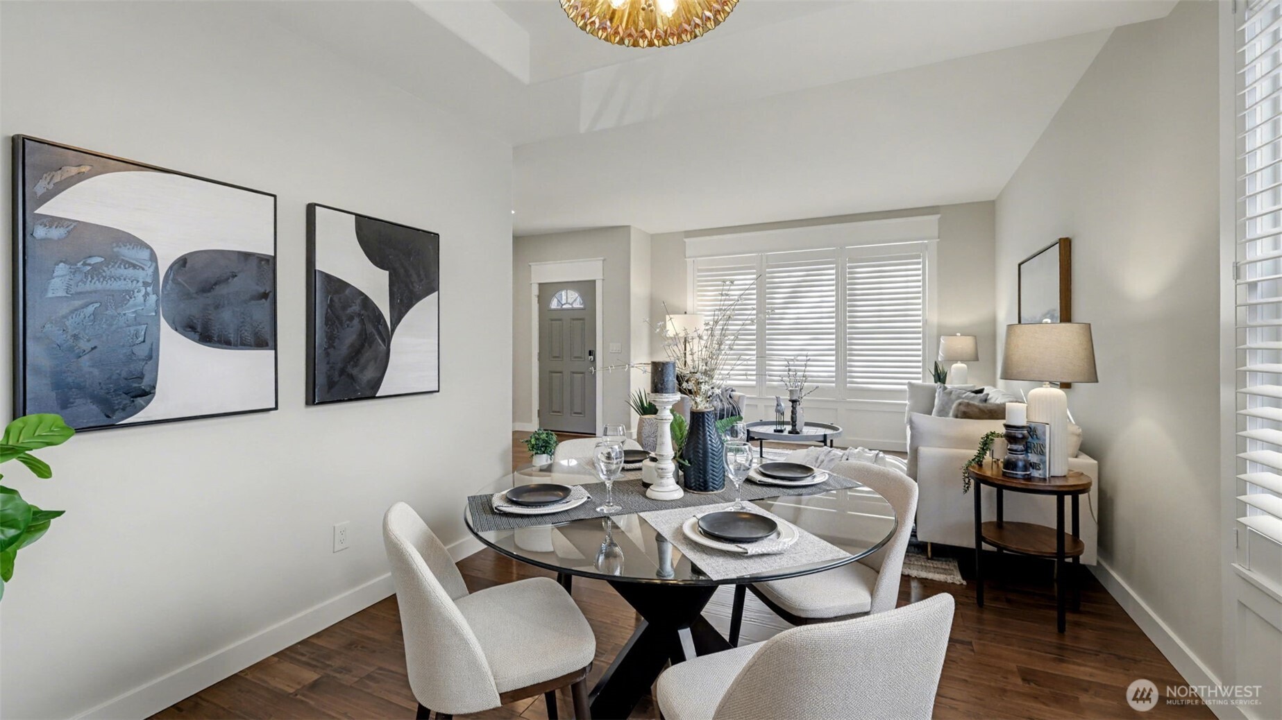 4817 Hartford Way Mukilteo, WA 98275 - Photo 9 of 36 a view of a dining room with furniture and wooden floor