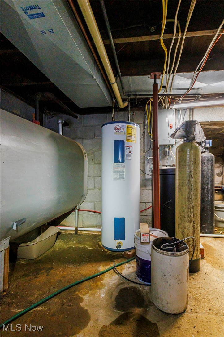 7997 Chestnut Ridge Road Northwest Beach City, OH 44608 - Photo 15 of 31 Utilities featuring electric water heater and oil tank