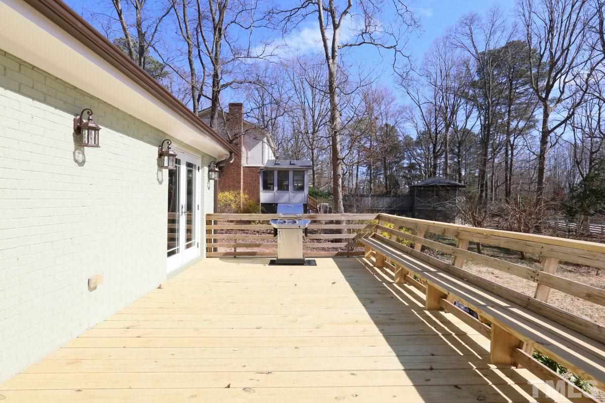 8517 Shadow Wood Place Raleigh, NC 27613 - Photo 24 of 25 a view of house with outdoor space