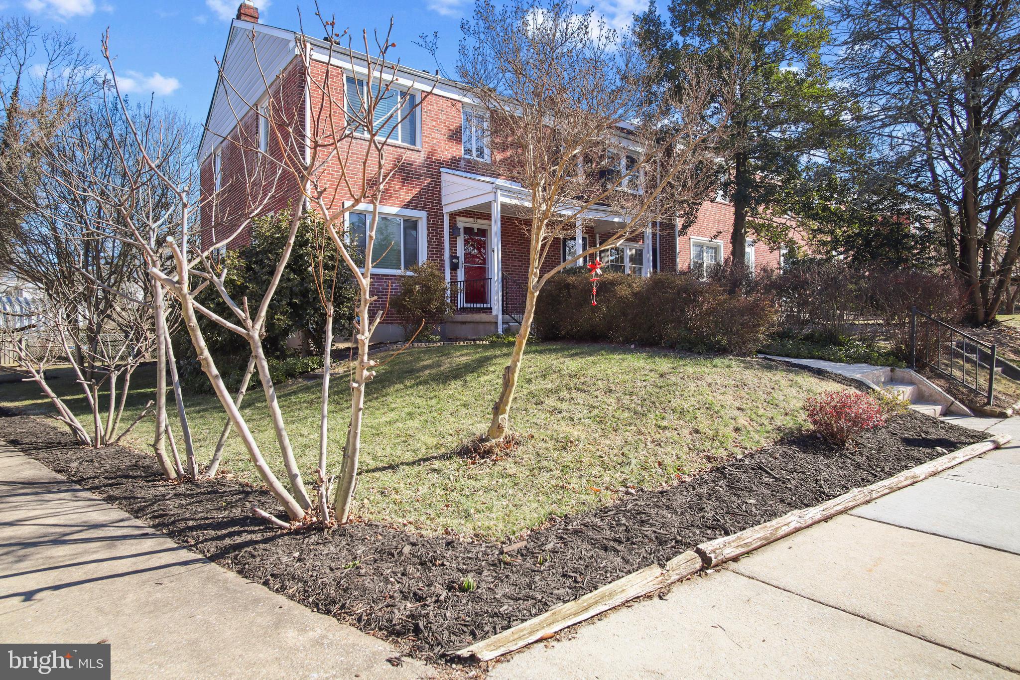 69 Aigburth Avenue Towson, MD 21286 - Photo 2 of 32 a view of a backyard with plants and a patio