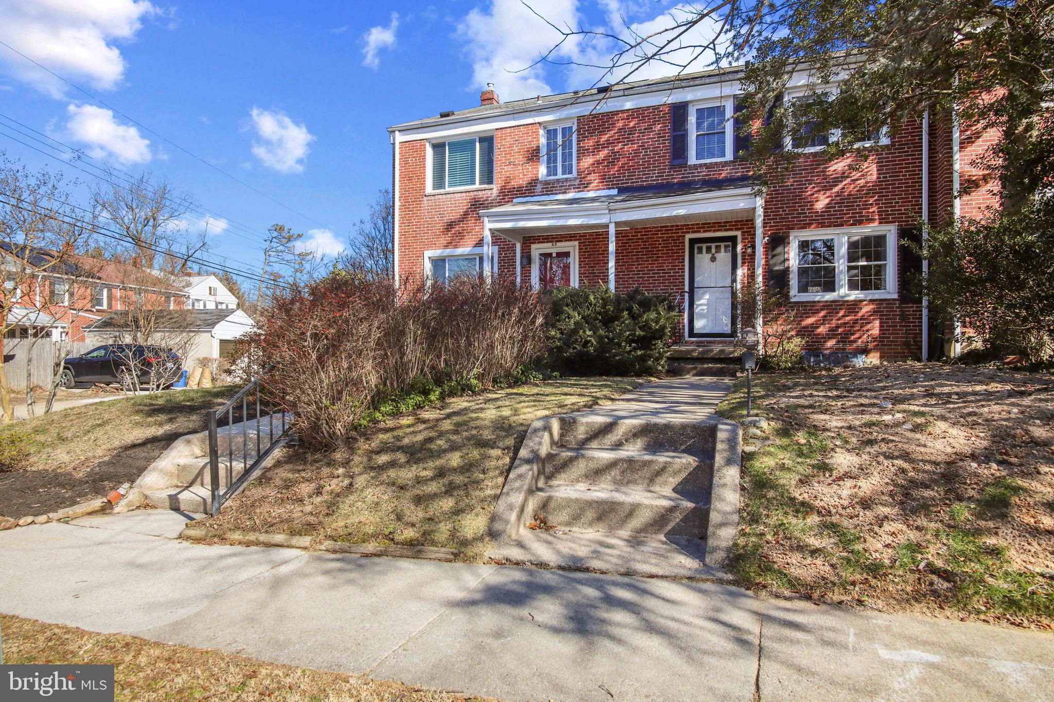 69 Aigburth Avenue Towson, MD 21286 - Photo 3 of 32 a front view of a house with a yard