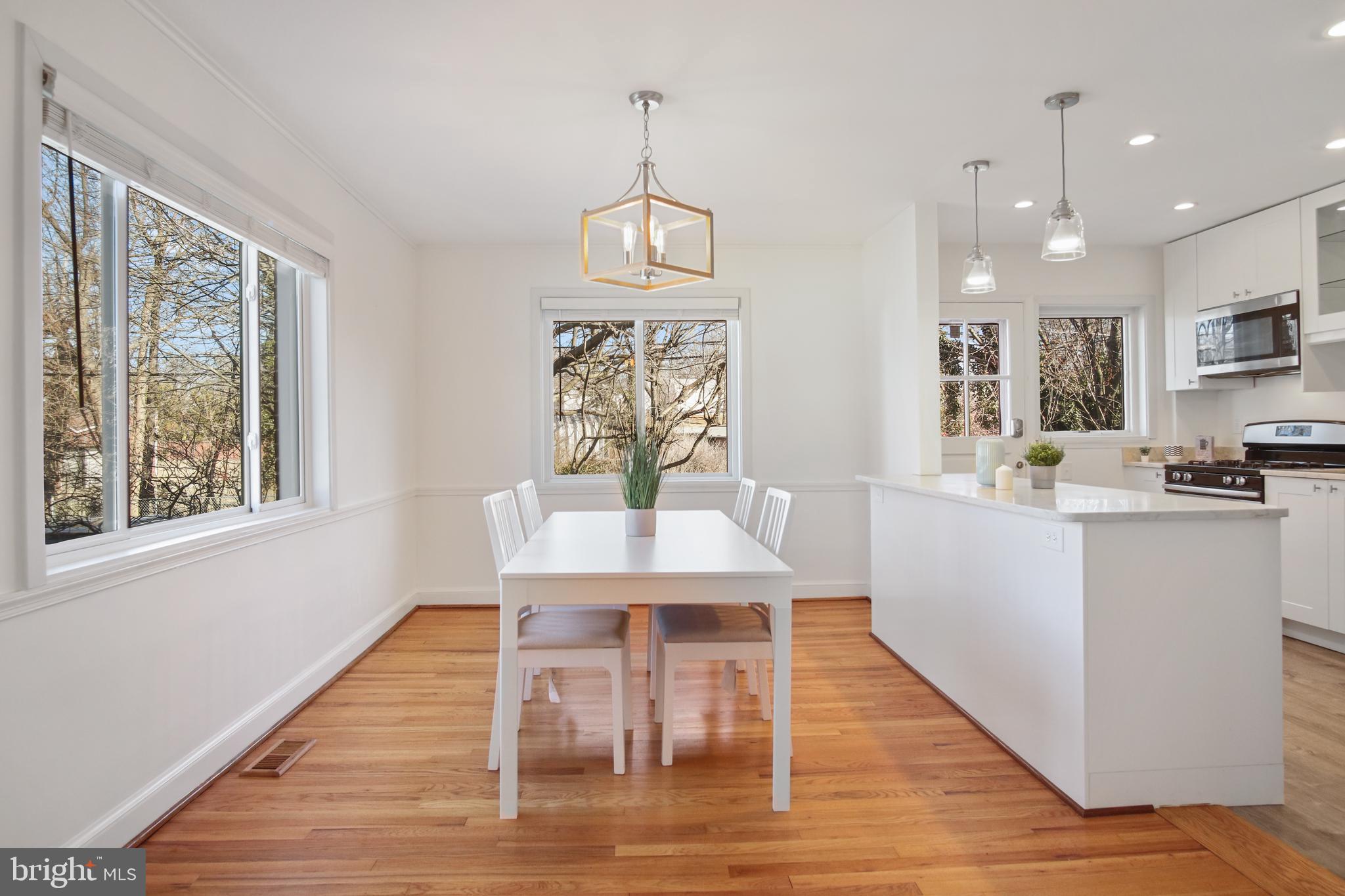 69 Aigburth Avenue Towson, MD 21286 - Photo 7 of 32 a view of a dining room with furniture window and wooden floor