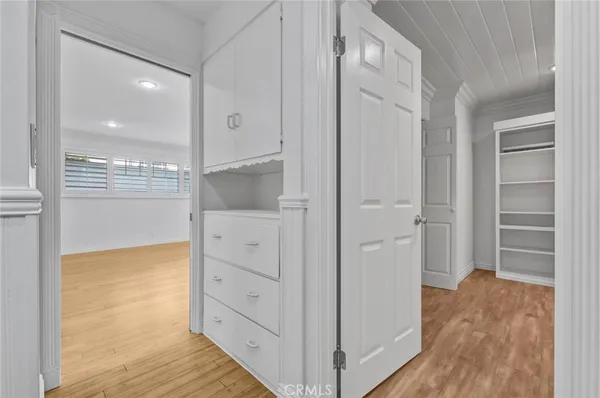 a bathroom with a sink a mirror and shower