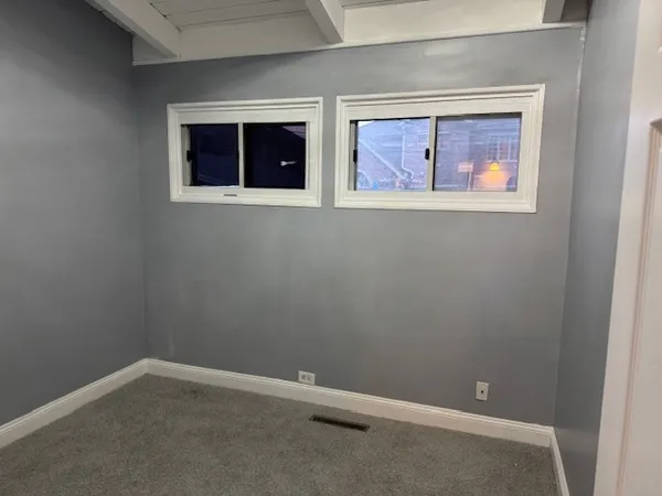 a view of a yard in front of a house