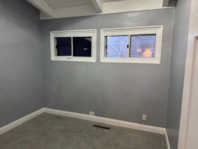 a view of a yard in front of a house