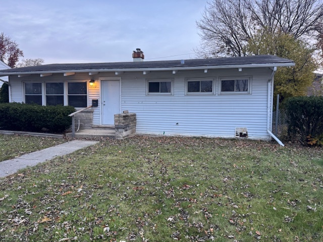 7100 Wilson Terrace Morton Grove, IL 60053 - Photo 2 of 15 a view of a house with a yard