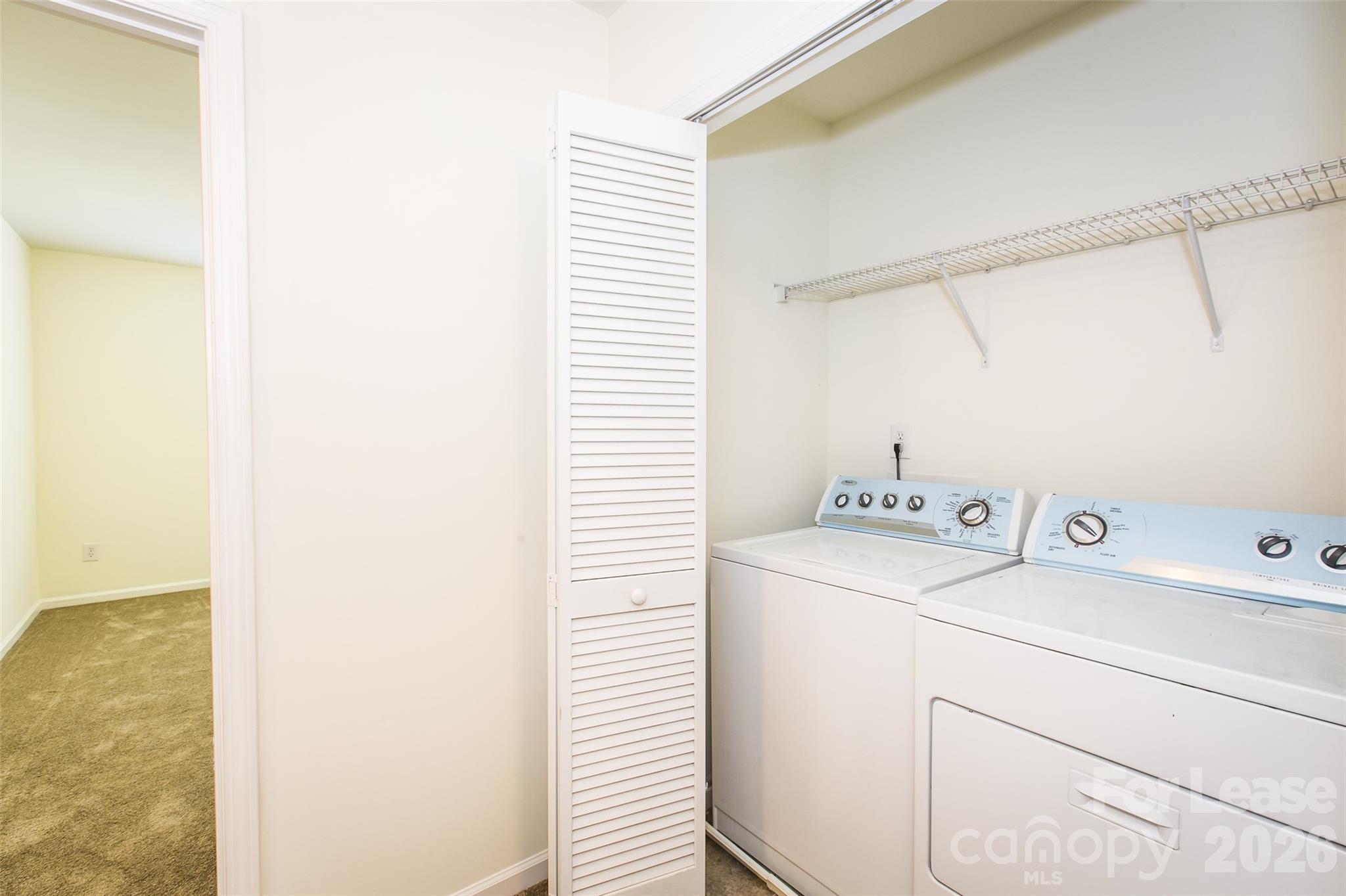 13422 Erwin Road Charlotte, NC 28273 - Photo 19 of 35 a utility room with dryer and washer
