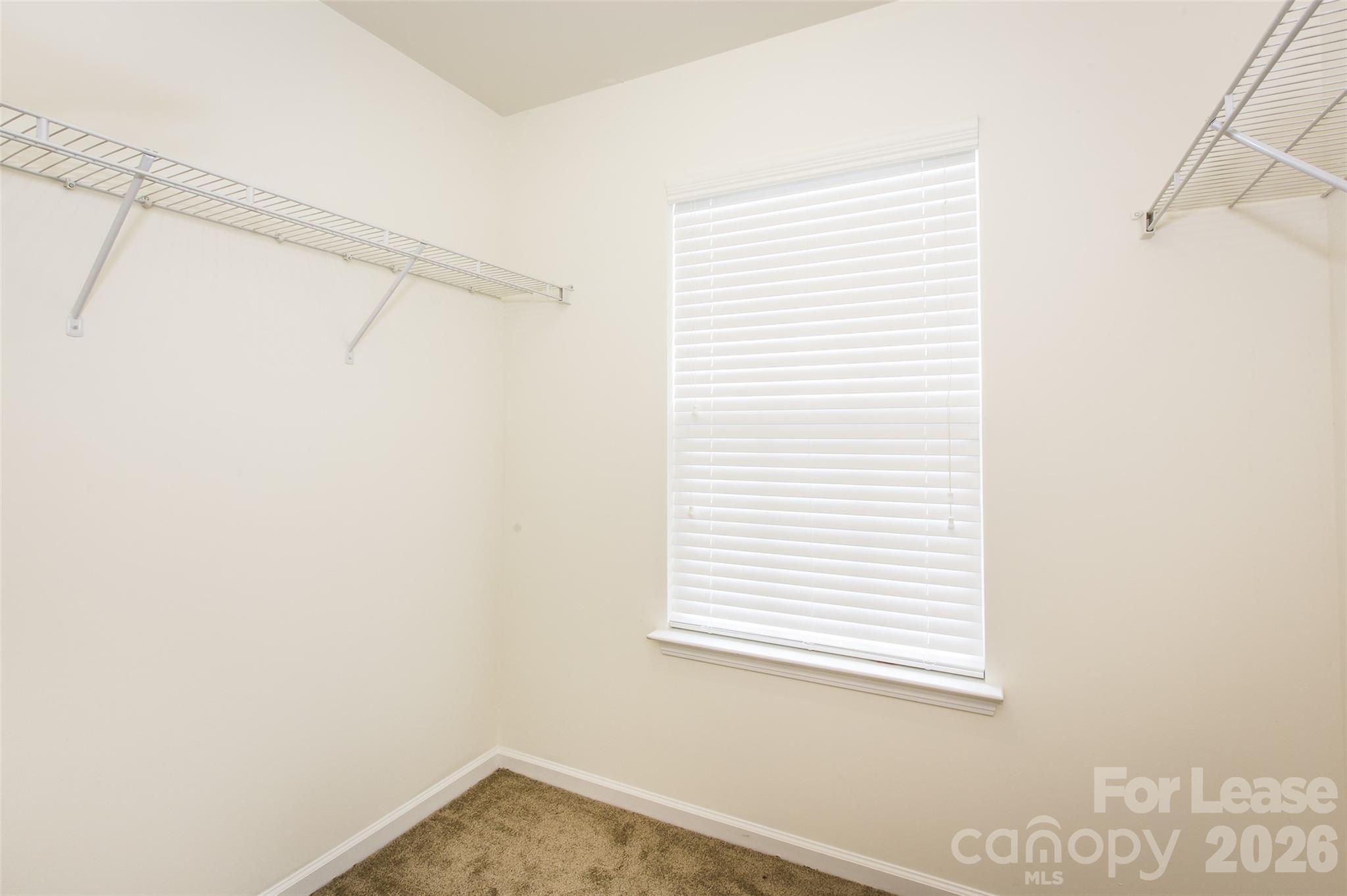 13422 Erwin Road Charlotte, NC 28273 - Photo 20 of 35 a small space with a window and a fan