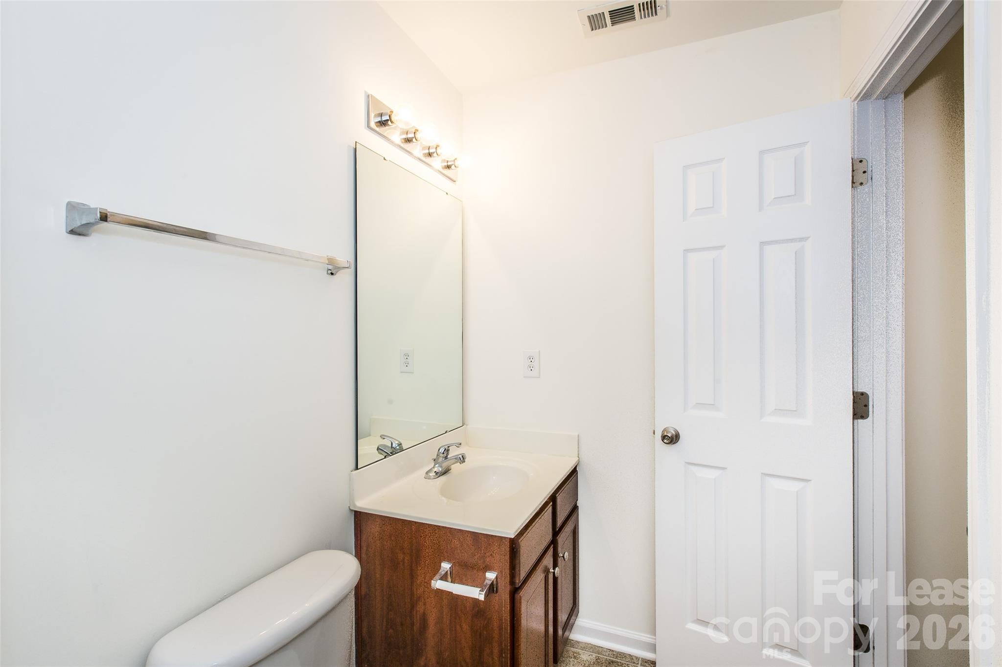 13422 Erwin Road Charlotte, NC 28273 - Photo 29 of 35 a bathroom with a sink a toilet and shower