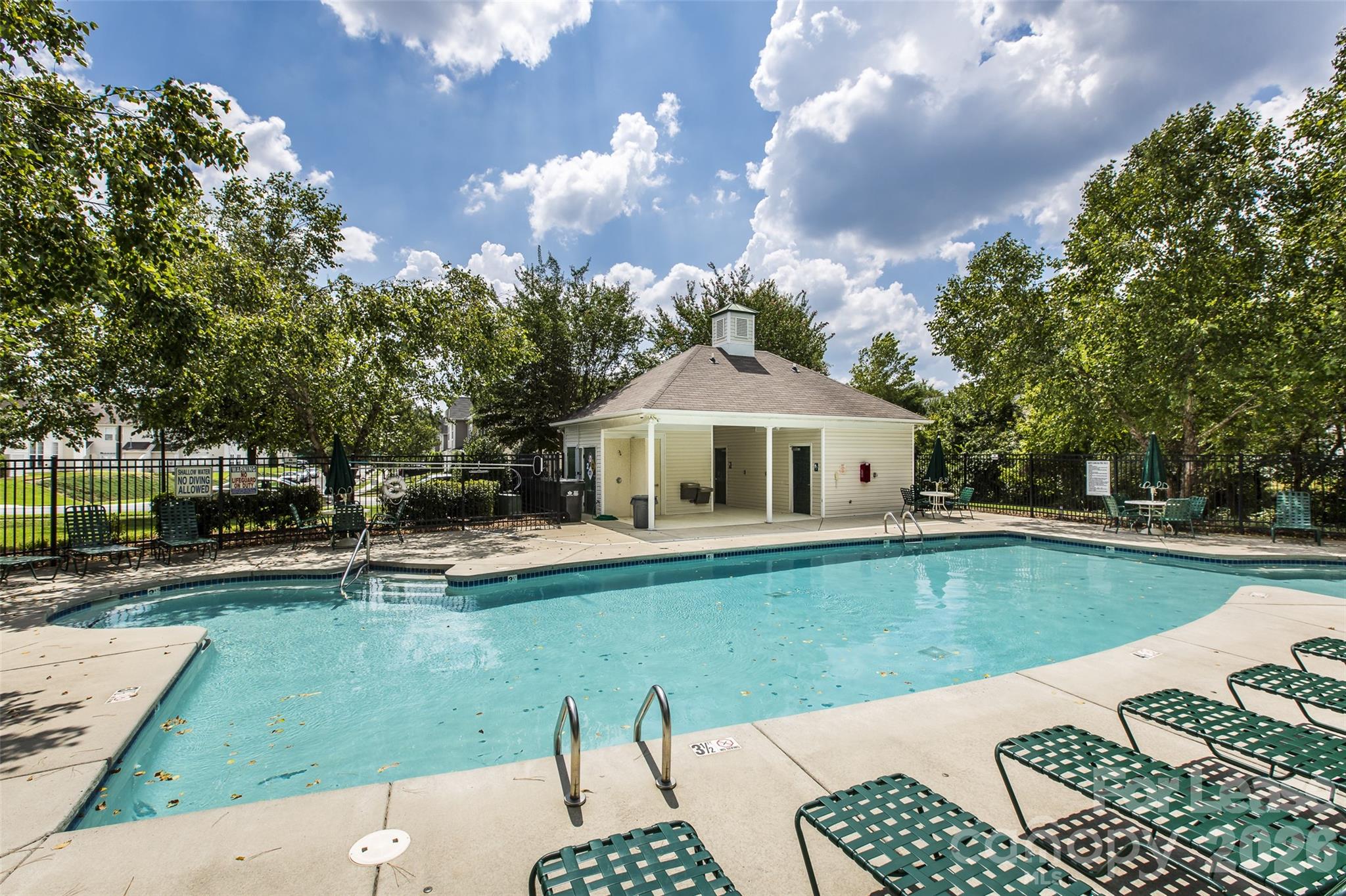 13422 Erwin Road Charlotte, NC 28273 - Photo 35 of 35 a view of a house with swimming pool and sitting area