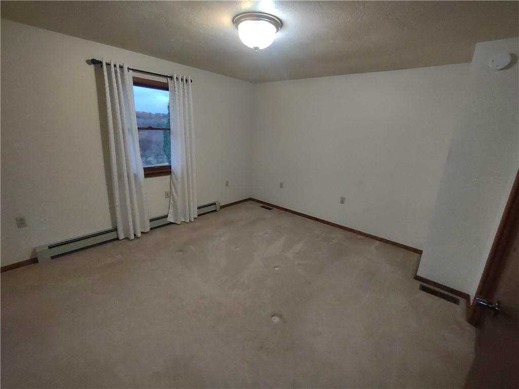 4641 Ellwood Road New Castle, PA 16101 - Photo 13 of 26 an empty room with closet area