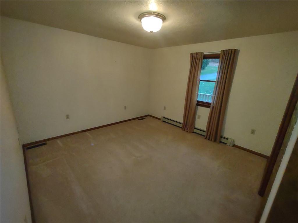 4641 Ellwood Road New Castle, PA 16101 - Photo 15 of 26 an empty room with a mirror