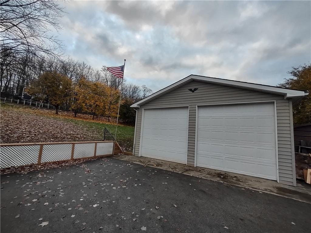 4641 Ellwood Road New Castle, PA 16101 - Photo 24 of 26 a view of a house with a yard