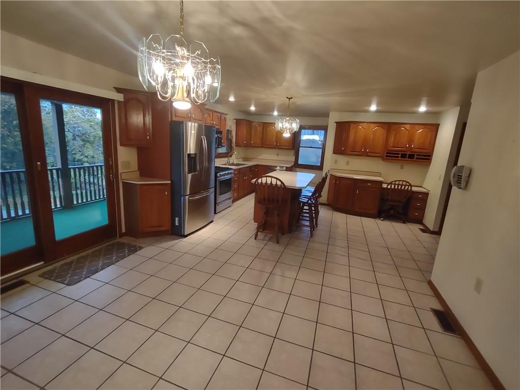 4641 Ellwood Road New Castle, PA 16101 - Photo 6 of 26 a view of a dining room with furniture