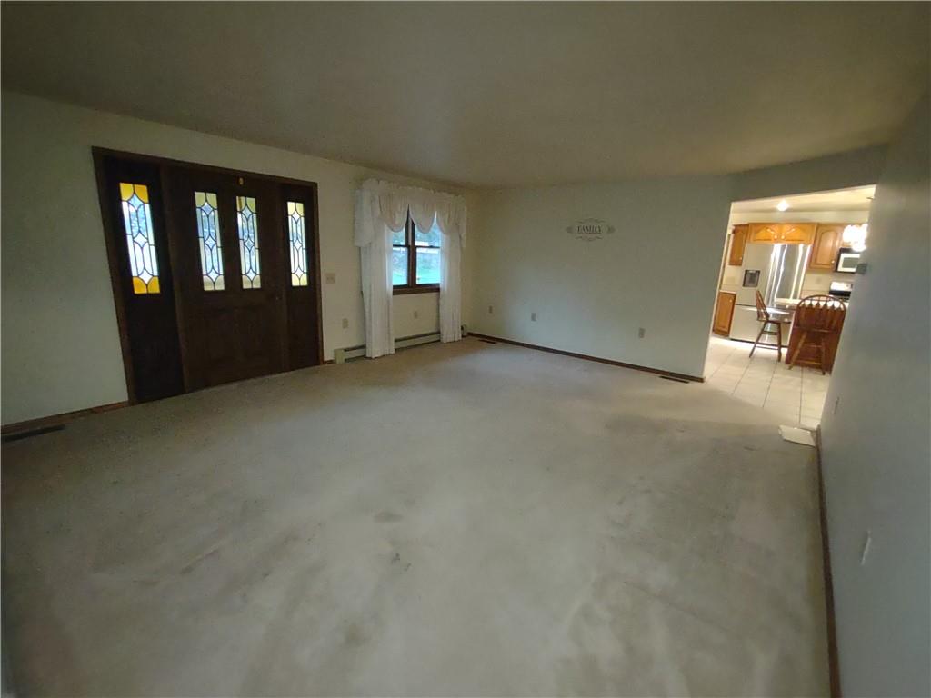 4641 Ellwood Road New Castle, PA 16101 - Photo 10 of 26 a view of an empty room with a window