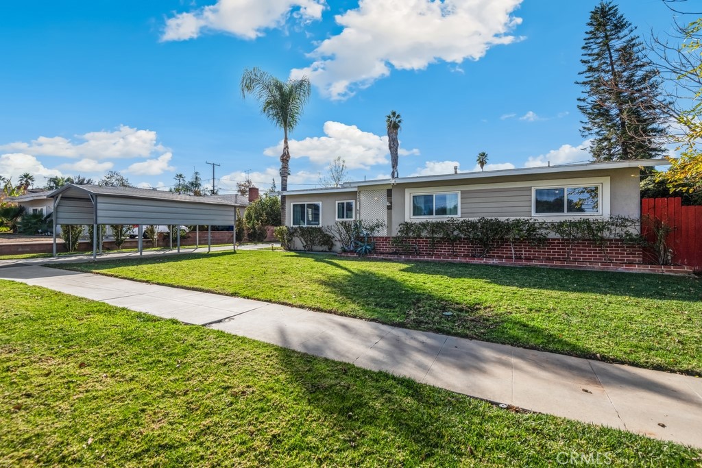 2982 Jane Street Riverside, CA 92506 - Photo 1 of 1 a view of house with a big yard and potted plants