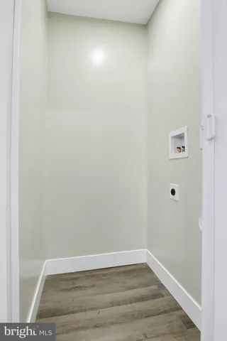 a bathroom with a toilet sink and shower