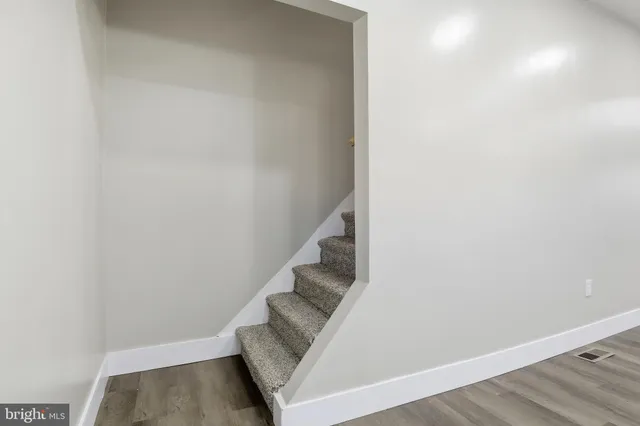 a bathroom with a toilet sink