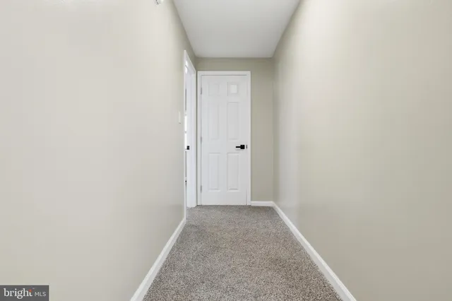 a bathroom with a toilet a sink and shower