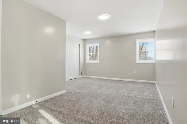 a view of a chair and table in the balcony