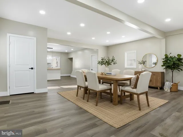 a view of kitchen with refrigerator and window