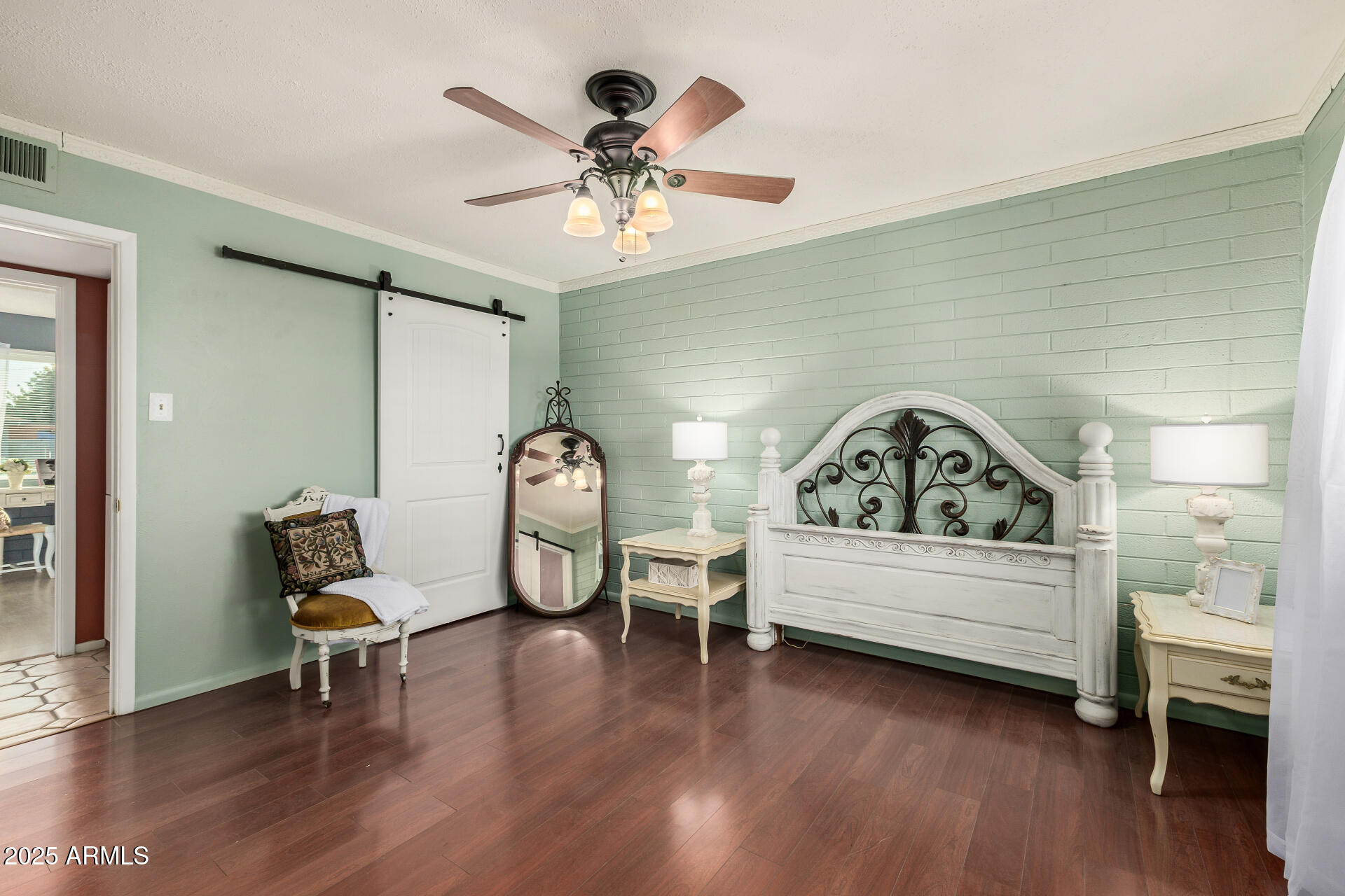 2302 West Berridge Lane Phoenix, AZ 85015 - Photo 19 of 40 a view of a livingroom with furniture and wooden floor