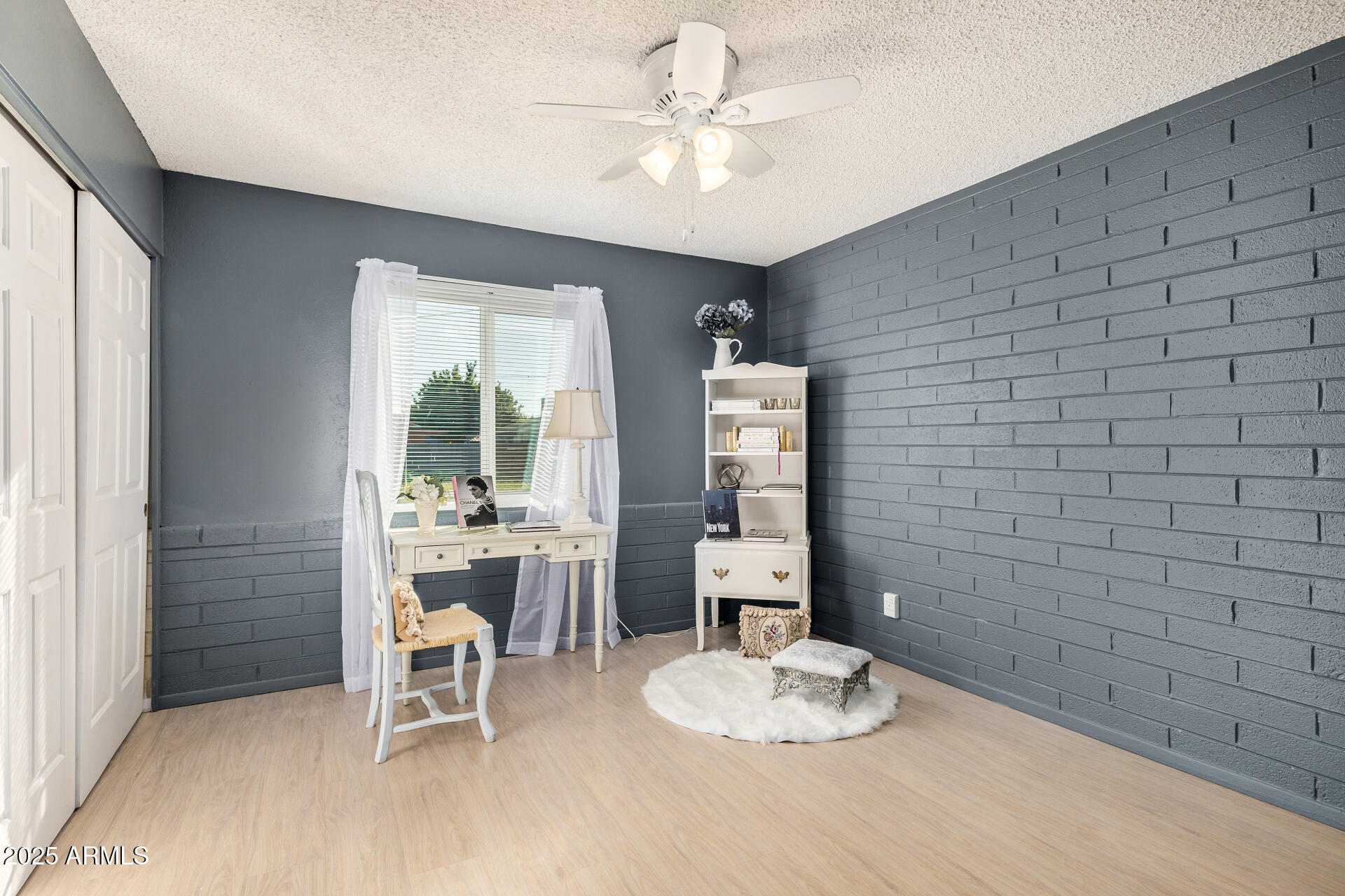 2302 West Berridge Lane Phoenix, AZ 85015 - Photo 23 of 40 a dining room with furniture and a chandelier
