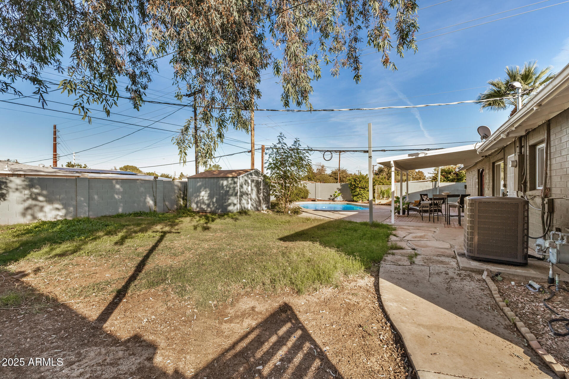 2302 West Berridge Lane Phoenix, AZ 85015 - Photo 37 of 40 a view of a yard with wooden fence