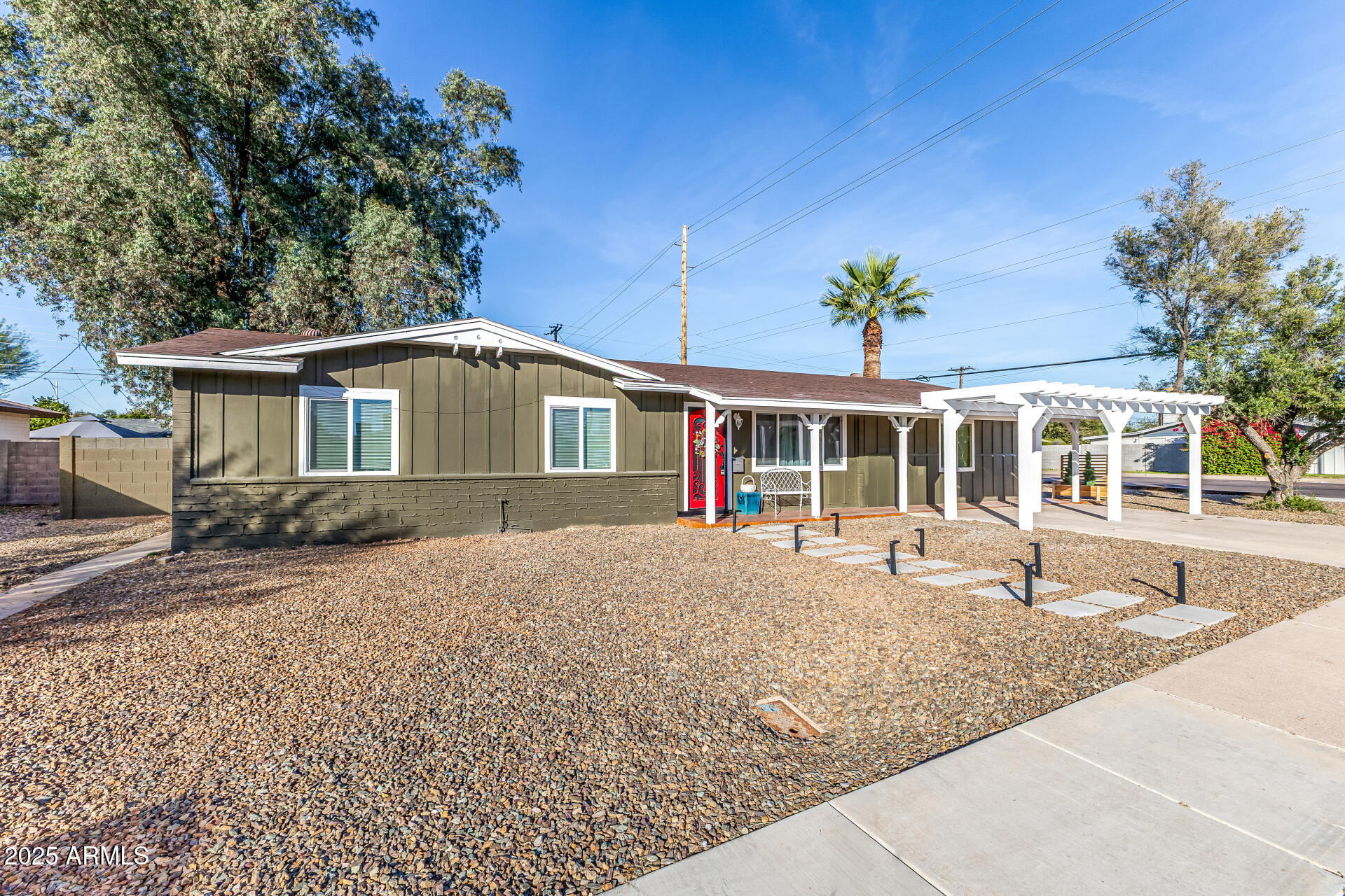2302 West Berridge Lane Phoenix, AZ 85015 - Photo 40 of 40 front view of a house with a porch