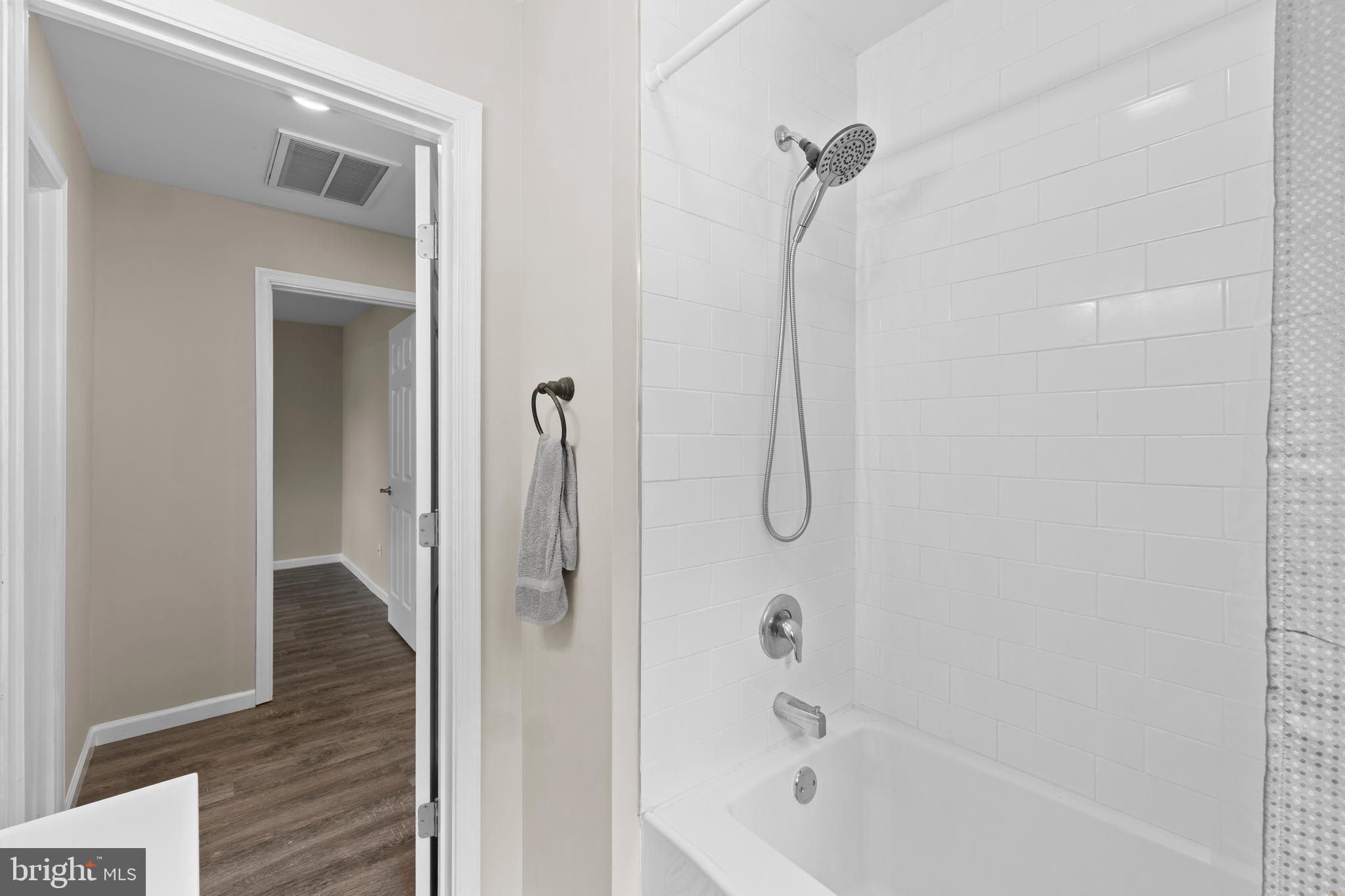 6475 Big Stone Beach Road Milford, DE 19963 - Photo 23 of 52 a bathroom with a shower