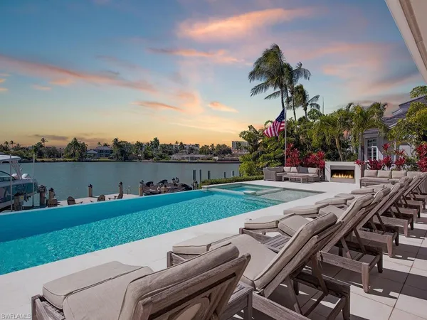 a view of a city with lawn chairs and a big yard