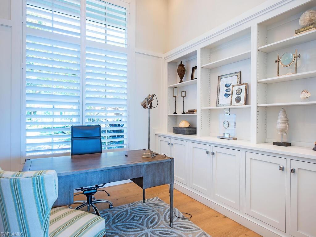 440 Springline Drive Naples, FL 34102 - Photo 15 of 28 a workspace with furniture and a window