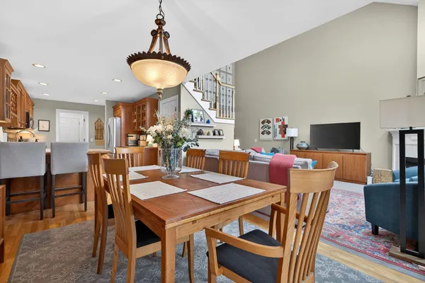 a living room with furniture and a table