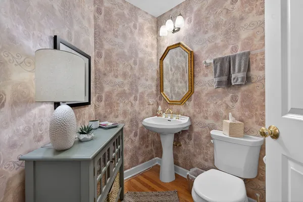 a bathroom with a sink double vanity and a mirror