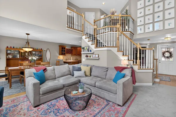 a kitchen with a refrigerator stove top oven and sink