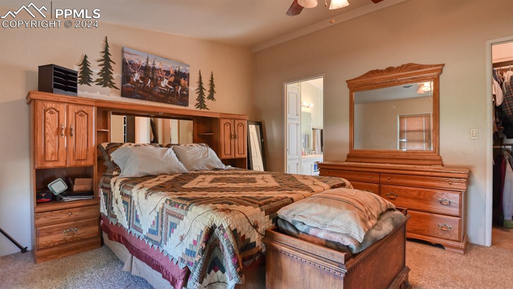 34475 East Jones Road Yoder, CO 80864 - Photo 13 of 31 a bedroom with a bed and a window